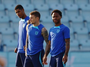 England's Raheem Sterling (right) left the team's camp after a break-in at his home in London.
