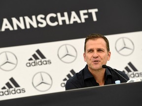 This file photo taken in 2018 shows Germany's national football team manager Oliver Bierhoff during a news conference at the Rungghof training center in Girlan, close to Bolzano, northeastern Italy.