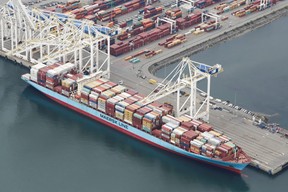 FILE PHOTO: The ship Anna Maersk is docked at Roberts Bank port carrying 69 containers of mostly paper and plastic waste returned by the Philippines in Vancouver, British Columbia, Canada June 29, 2019.