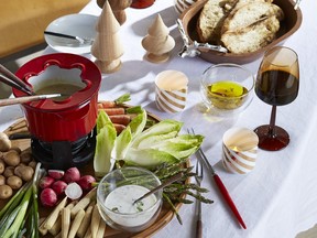 Help-yourself cocktails and snacks take the stress out of entertaining this holiday season. Red Fondue Dish, $25,  HOMESENSE