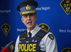 OPP Commissioner Thomas Carrique speaks during a new conference Thursday night at the OPP detachment in Cayuga.