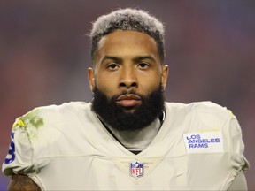 Wide receiver Odell Beckham Jr. of the Los Angeles Rams stands on the sidelines during the third quarter of the NFL game against the Arizona Cardinals at State Farm Stadium on December 13, 2021 in Glendale, Arizona. The Rams defeated the Cardinals 30-23.
