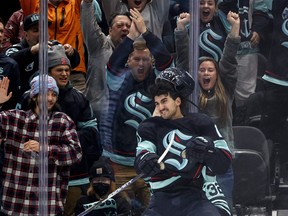 Matty Beniers of the Seattle Kraken celebrates his goal against the San Jose Sharks during the third period at Climate Pledge Arena on November 23, 2022 in Seattle, Washington. (Photo by /)