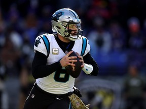 Quarterback Baker Mayfield of the Carolina Panthers throws a pass against the Baltimore Ravens at M&T Bank Stadium on November 20, 2022 in Baltimore, Maryland.
