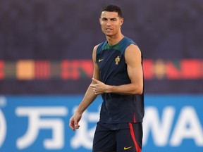 Cristiano Ronaldo of Portugal looks on  during the Portugal Training Session at Al Shahaniya SC Training Site on December 09, 2022 in Doha, Qatar.