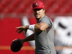 Blaine Gabbert of the Tampa Bay Buccaneers warms up prior to game against the Cincinnati Bengals at Raymond James Stadium on December 18, 2022 in Tampa, Florida.