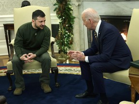 U.S. President Joe Biden (R) meets with President of Ukraine Volodymyr Zelensky in the Oval Office of the White House on December 21, 2022 in Washington, DC.