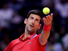 Novak Djokovic serves against Sebastian Ofner during day the World Tennis League at Coca-Cola Arena on Dec. 23, 2022 in Dubai, United Arab Emirates.