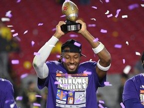 The TCU Horned Frogs celebrate after defeating the Michigan Wolverines in the Vrbo Fiesta Bowl at State Farm Stadium on December 31, 2022 in Glendale, Arizona.