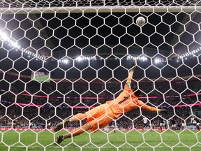 Harry Kane of England misses a penalty against Hugo Lloris of France during the FIFA World Cup.