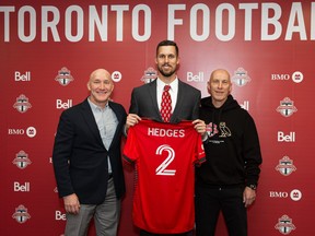 Toronto FC unveiled new signing Matt Hedges (centre) during a news conference on Tuesday.