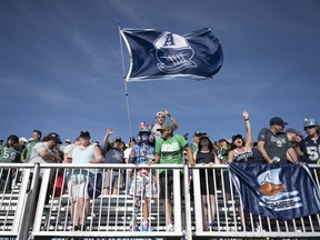 Fans cheer following the CFL Touchdown Atlantic game between the Toronto Argonauts and the Saskatchewan Roughriders at Acadia University in Wolfville, N.S.