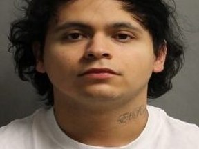 Brendonn Sevilla-Zelaya, 25, of Toronto, is charged with robbery, assault causing bodily harm, and uttering threat after being arrested on Saturday, Dec. 17, 2022.