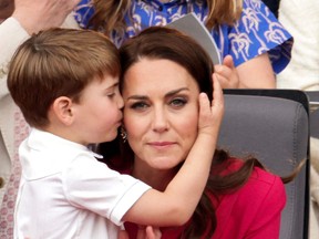 Catherine is hugged by her son Prince Louis during the Platinum Pageant in London on June 5, 2022 as part of Queen Elizabeth II's platinum jubilee celebrations.