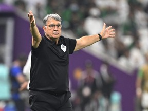 Mexico's Argentinian coach Gerardo Martino gestures on the touchline during the Qatar 2022 World Cup Group C football match between Saudi Arabia and Mexico at the Lusail Stadium in Lusail, north of Doha on November 30, 2022.