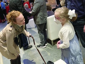 Alex Creighton, left, meets Madi Ambos at Sun party.