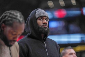 Los Angeles Lakers’ LeBron James watches from courtside against the Raptors during the second quarter. Nick Turchiaro-USA TODAY Sports