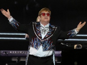Elton John performs "Bennie and the Jets" as he wraps up the U.S. leg of his Yellow Brick Road tour at Dodger Stadium in Los Angeles, Calif., Nov. 20, 2022.
