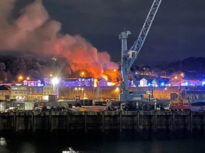 A general view of fire and smoke in Saint Helier following an explosion on the island of Jersey, Channel Islands December 10, 2022 in this picture obtained from social media.