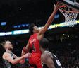 Toronto Raptors forward Scottie Barnes (4) drives to the basket over Sacramento Kings forward Domantas Sabonis (10) during the fourth quarter at Scotiabank Arena.