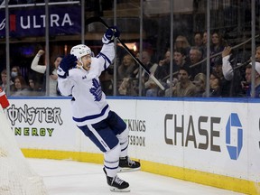 Maple Leafs left wing Michael Bunting celebrates his goal against the New York Rangers on Thursday night. Bunting now has at least a point in 10 consecutive games.