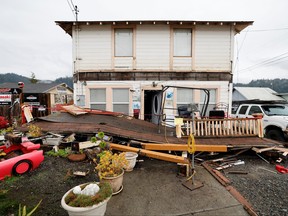 The collapsed second story porch of a house is seen after a strong 6.4-magnitude earthquake struck off the coast of northern California, in Rio Dell, Calif., Dec. 20, 2022.