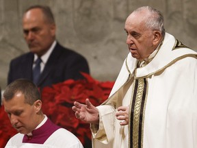 Pope Francis celebrates Christmas Eve mass in St. Peter's Basilica at the Vatican on Dec. 24, 2022.