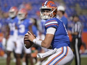 Florida quarterback Jalen Kitna warms up before an NCAA college football game against Eastern Washington, Sunday, Oct. 2, 2022, in Gainesville, Fla.