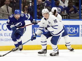 Maple Leafs' Mitch Marner starts the breakout in front of Tampa Bay Lightning's Brandon Hagel during the first period on Saturday, Dec. 3, 2022, in Tampa, Fla.