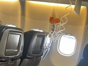 This mobile photo courtesy of passenger Jazmin Bitanga shows the interior of a Hawaiian Airlines plane on its flight from Phoenix to Honolulu, Sunday, Dec. 18, 2022, after severe turbulence rocked the flight.