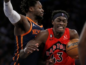 Raptors' Pascal Siakam drives past Knicks' Julius Randle, left, during the first half on Wednesday, Dec. 21, 2022, in New York.