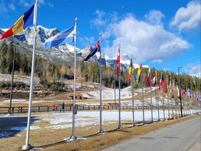 Flags from the nations which competed in 1988 Winter Olympic events at the Canmore Nordic Centre in Canmore, Alta. are on display in alphabetical order, starting (from left) with Andorra, Argentina, Australia and Austria.