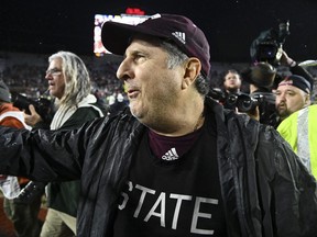 Mississippi State Bulldogs head coach Mike Leach walks onto the field after the game against the Ole Miss Rebels at Vaught-Hemingway Stadium.