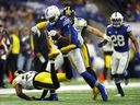 Pittsburgh Steelers outside linebacker T.J. Watt prepares to punch the ball after a catch by Indianapolis Colts tight end Jelani Woods during the second half at Lucas Oil Stadium. 