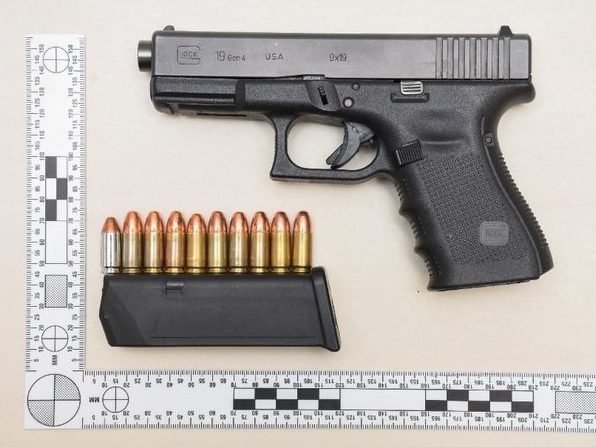 Parolee charged after loaded firearm, drugs seized