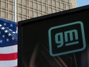 The new GM logo is seen on the facade of the General Motors headquarters in Detroit, March 16, 2021.