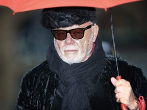Gary Glitter, real name Paul Gadd, arrives at Southwark Crown Court in London, England, Feb. 5, 2015.