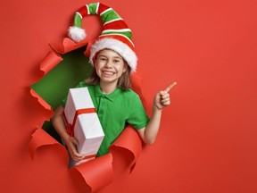 Santa's elf on bright color background