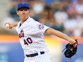 Chris Bassitt of the New York Mets pitches in the first inning against the Cincinnati Reds at Citi Field on August 08, 2022 in New York City.