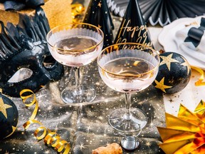 New year table setting with decoration for dining and party in black and golden tone