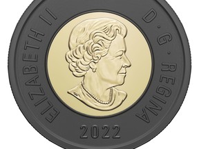 The 2022 “toonie” to mark the death of Queen Elizabeth II is gold with a black outer ring to indicate mourning. The Canadian $2 coin is usually gold with a silver outer ring.