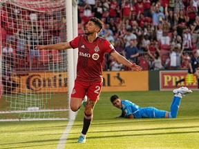 Toronto FC midfielder Jonathan Osorio celebrates after scoring during an MLS match. Osorio has signed a new three-year contract plus a 2026 option with Toronto, using targeted allocation money.