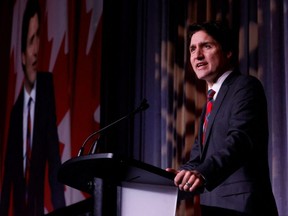 Prime Minister Justin Trudeau speaks at the Liberal national caucus holiday party in Ottawa, Wednesday, Dec. 14, 2022.