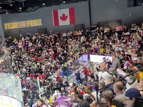 A Canadian flag is on display at Mullett Arena in Tempe, Ariz., the new home of the NHL’s Arizona Coyotes.