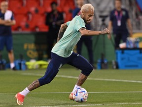 Brazil's forward  Neymar takes part in a training session at the Al Arabi SC Stadium in Doha on Thursday. Getty Images