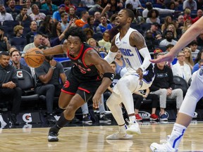Dec 9, 2022; Orlando, Florida, USA; Toronto Raptors forward O.G. Anunoby (3) drives to the basket against Orlando Magic guard Terrence Ross (31) during the second quarter at Amway Center. Mandatory Credit: Mike Watters-USA TODAY Sports