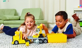 Kids playing with PAW Patrol Mega Rubble Big Rig Vehicle. (supplied)