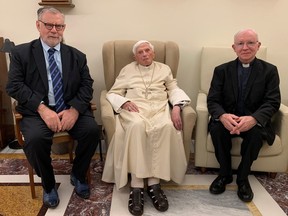 Former pope Benedict, 95, looks on as he receives the winners of the "Premio Ratzinger" at the Vatican, December 1, 2022.