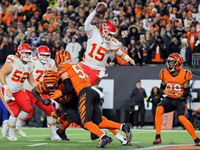 Chiefs quarterback Patrick Mahomes rushes for a touchdown against the Cincinnati during the third quarter in Cincinnati yesterday. The Bengals won 27-24.