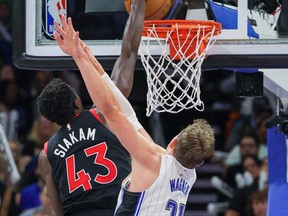 Toronto Raptors forward Pascal Siakam (43) dunks the ball against Orlando Magic center Moritz Wagner (21) during the second half at Amway Center.